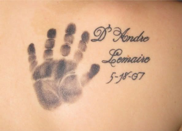 I have my son's name, birthday and handprint on my shoulder blade.